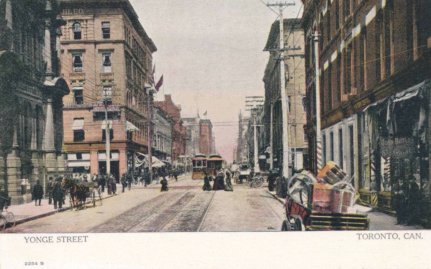 A POSTCARD - TORONTO - YONGE STREET - EXACT LOCATION UNKNOWN - STREETCARS - PEDESTRIANS - WAGONS - TINTED - 1912