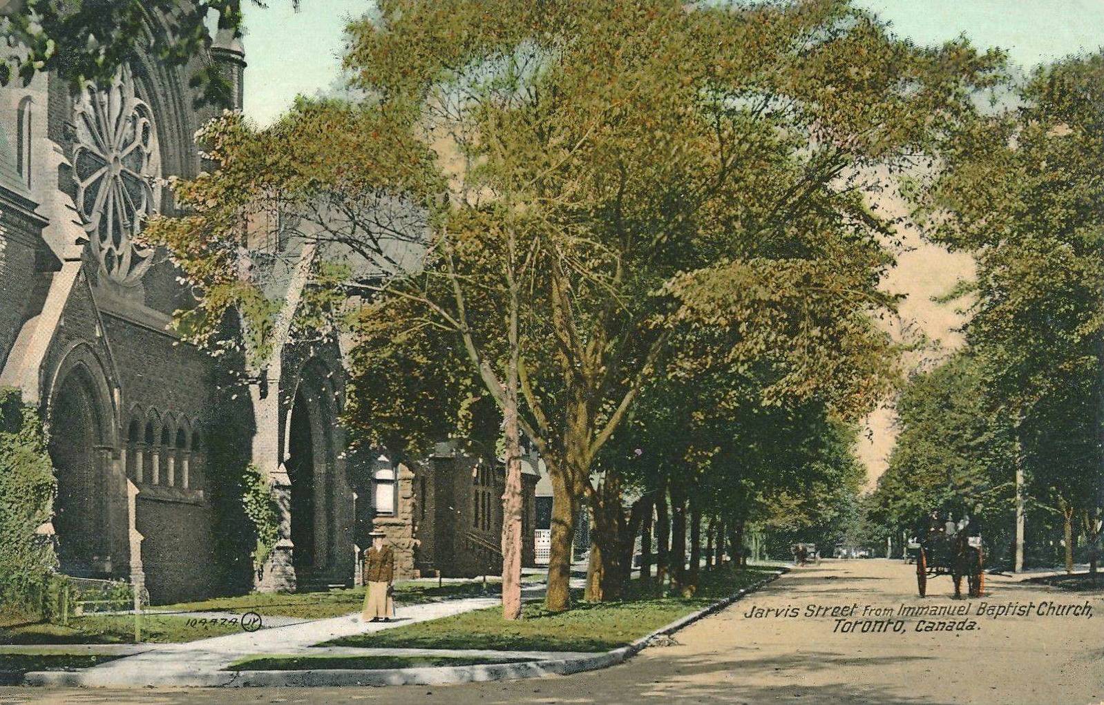 AA POSTCARD - TORONTO - JARVIS STREET - FROM IMMANUEL BAPTIST CHURCH - GROUND LEVEL - WOMAN WALKING IN FRONT OF CHURCH - WAGON - TREE-LINED - NICE VERSION - TINTED - c1910